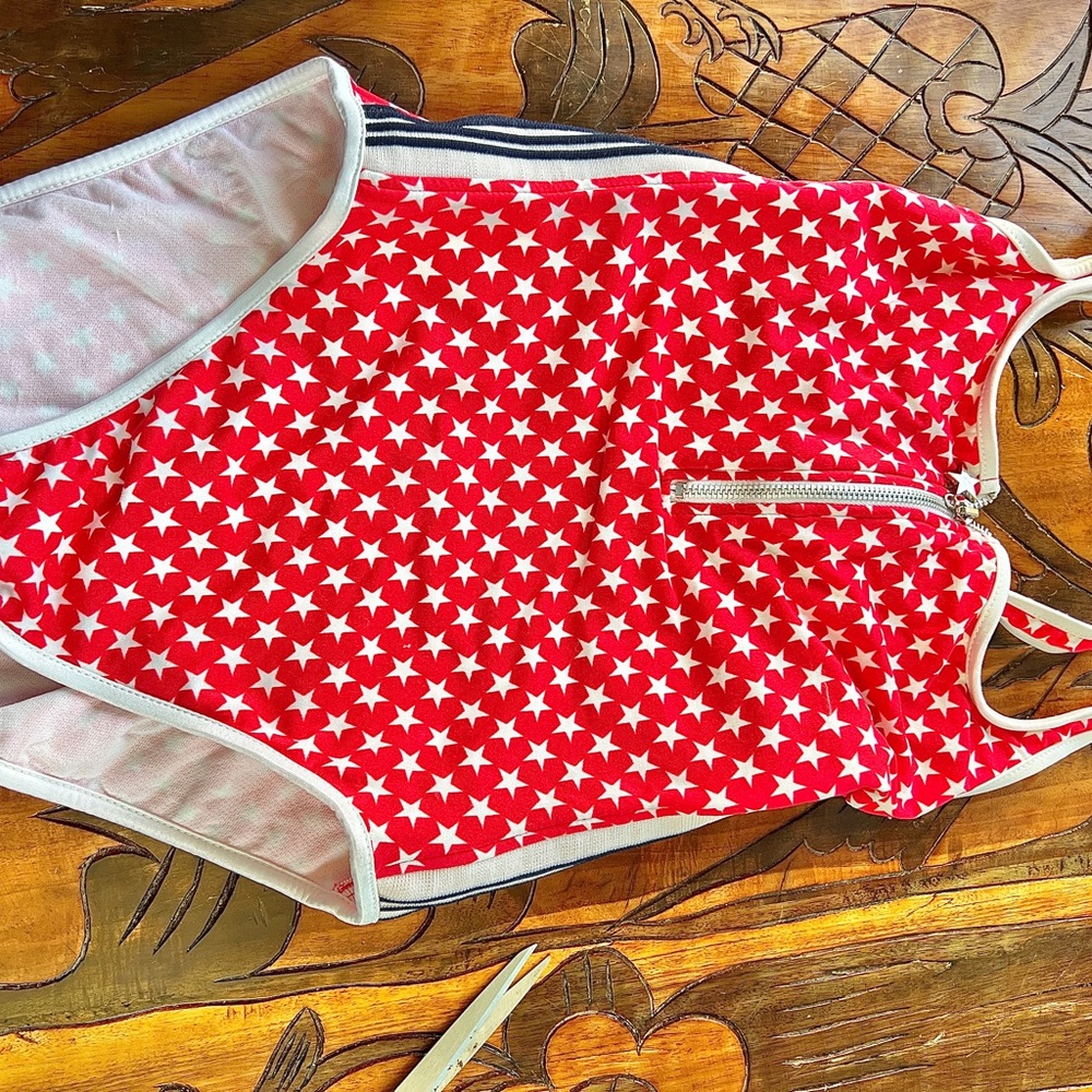 Red and White stars 1 piece woman’s vintage bathing suit size 13/14.